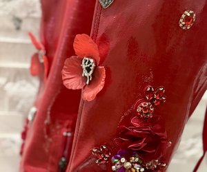 Crimson Secret Garden Couture Boots — Deep red flowers and delicate metallic charms adorn the glossy crimson surface.