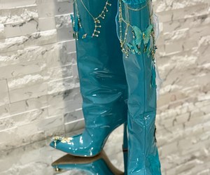 Élysée Papillon — The pair from the front, with decorative turquoise trim and delicate gold-tone chains.