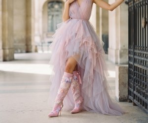 Butterfly Reverie — An editorial entrance in pink tulle and Butterfly Reverie couture boots.